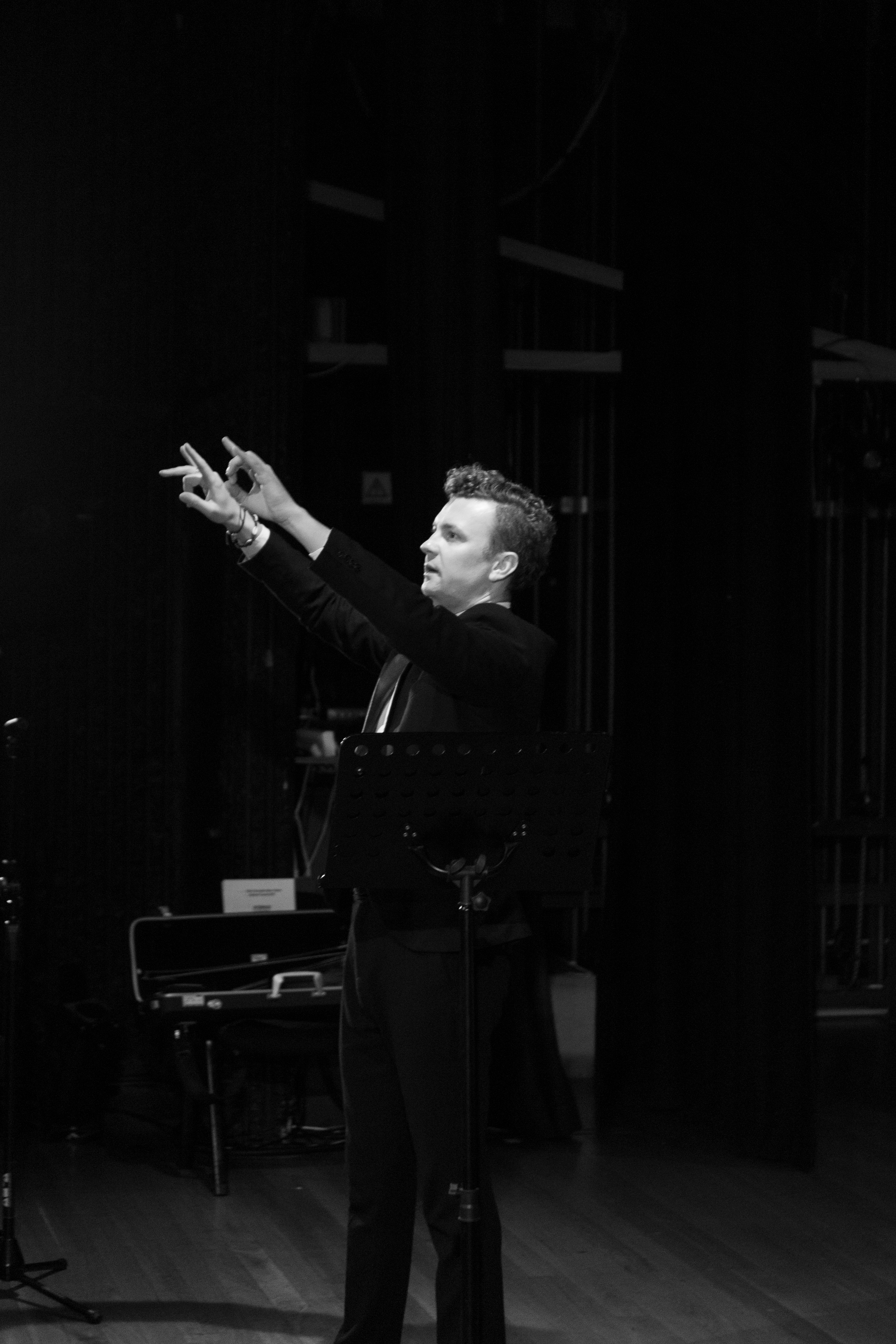 Dominik Przywara conducting — black and white